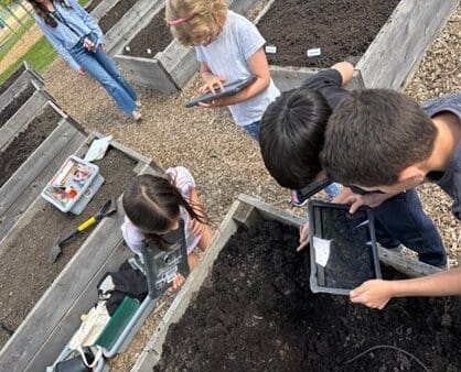 Older students took a more exploratory approach with a scavenger hunt, using iPads to document their discoveries in the school garden.
